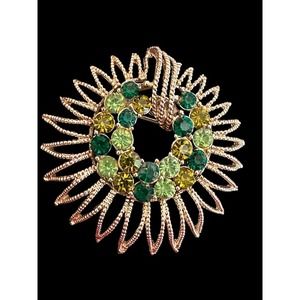 Vintage Gold Toned Starburst Brooch with Green Accents